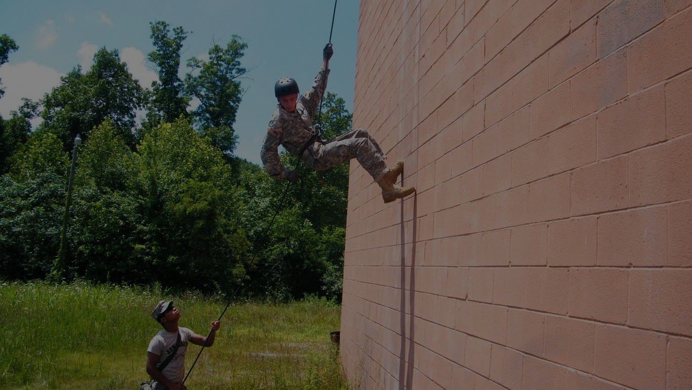 Man scaling building